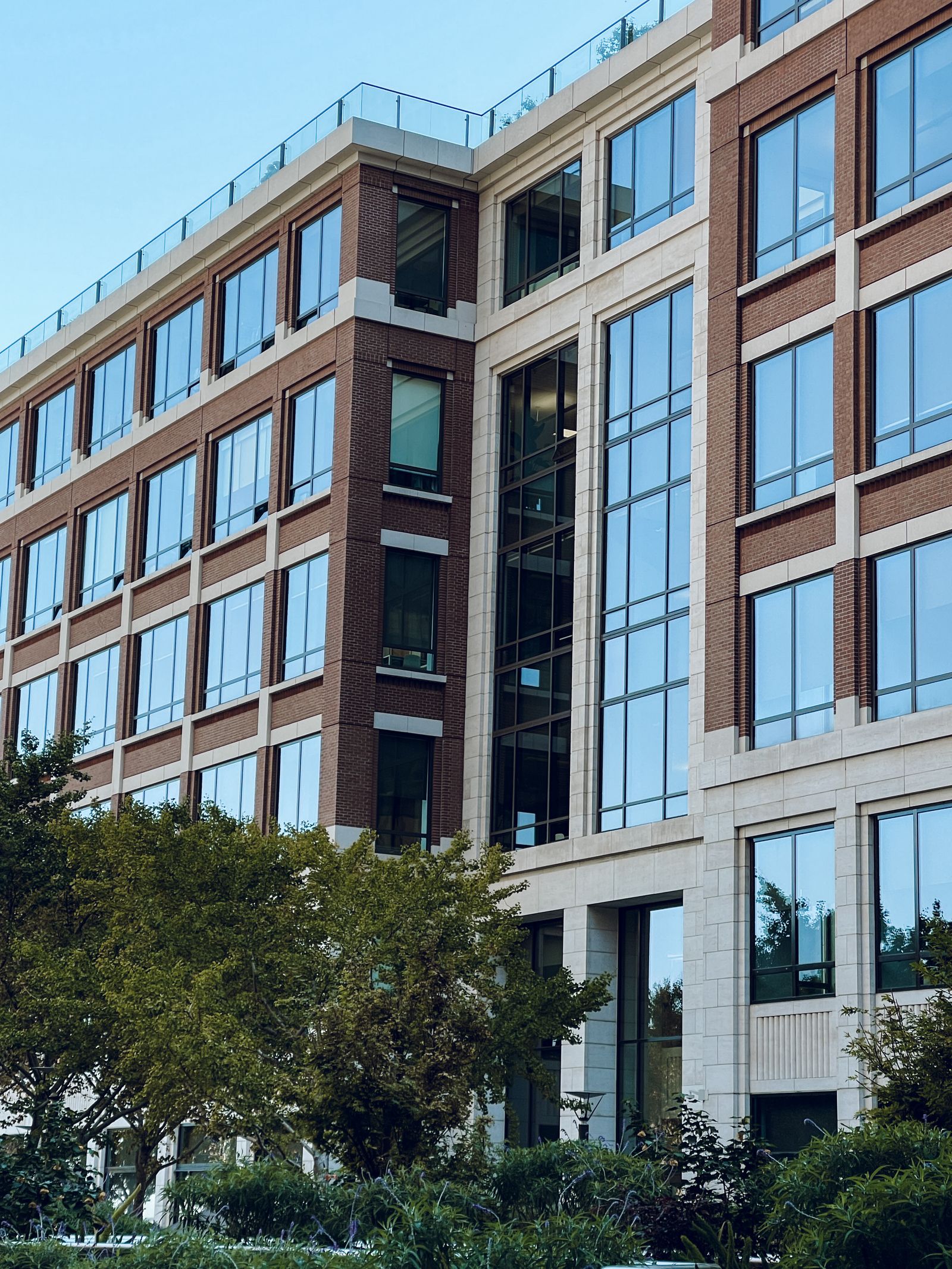 Modern commercial property with glass and masonry facade surfaces